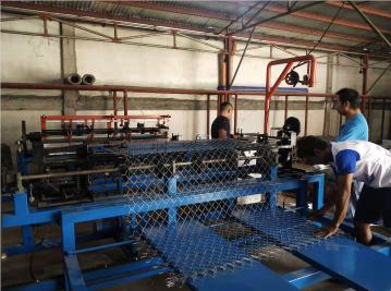 Automatic chain link fence machine working in Philippines