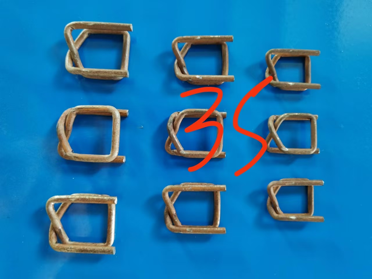 pp strap packing buckle making machine 